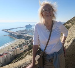 Martine in castle overlooking Alicante and our ship in the distance